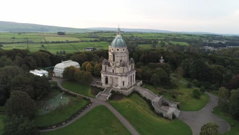 historic ashton memorial english wealthy landmark across lancashire countryside aerial wide orbit left view