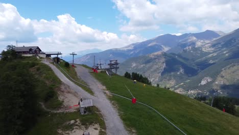 An-aerial-shot-of-a-ski-lift-in-the-French-Alphs-during-the-summer