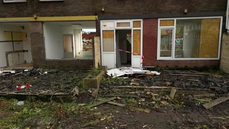 Rubbish-Heap-Outside-Apartment-House-During-Demolition