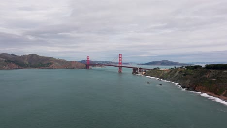 slow and dramatic drone shot near the golden gate bridge in california