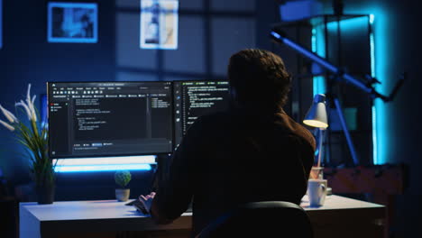 developer drinking coffee while writing lines of code on computer