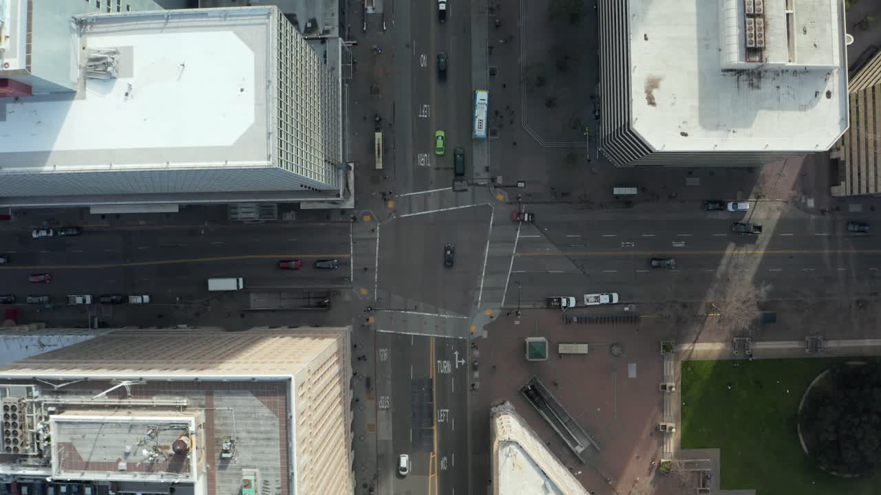 Overhead Aerial Shot of Downtown Oakland intersection as cars pass by, Bay Area California Commute