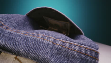 putting money into pocket