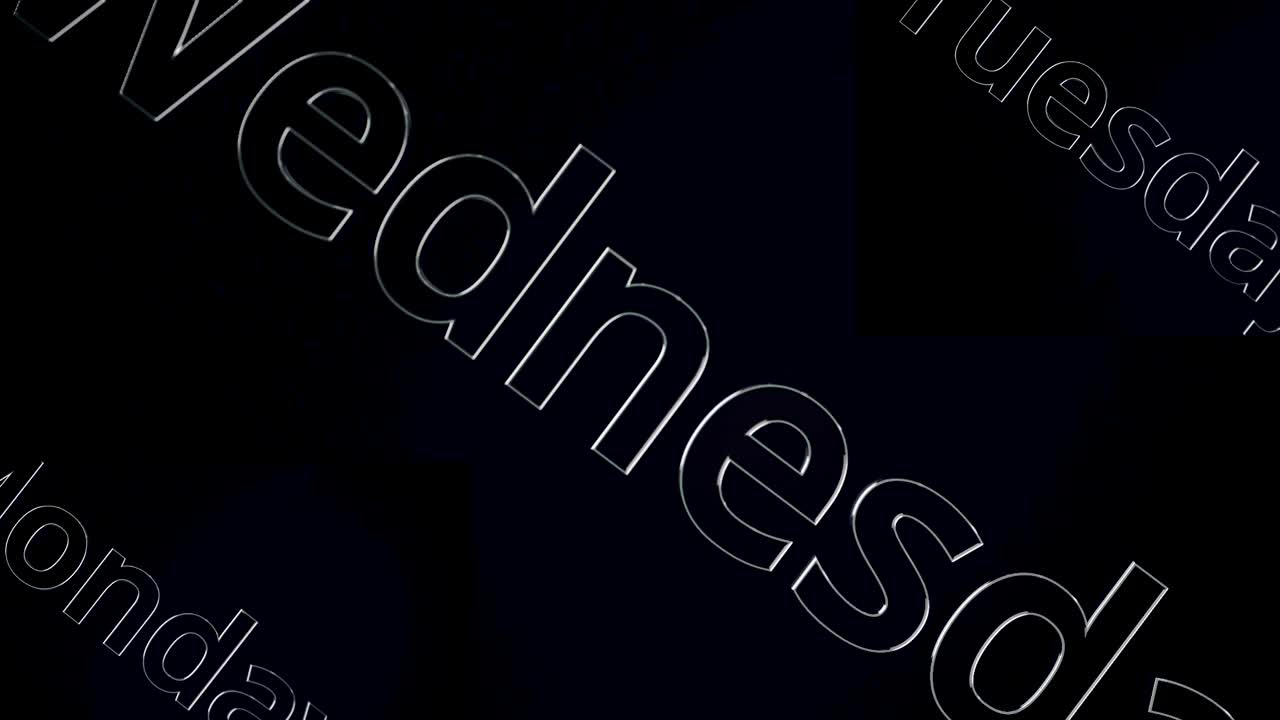 Close-up view of days of the week text overlayed and angled