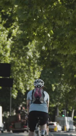 Vertical-Video-Of-Pedestrians-Cyclists-Traffic-Commuting-Work-The-Embankment