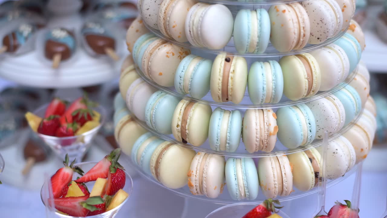 Cinematic close-up shot of dessert table on an event. Candy bar idea
