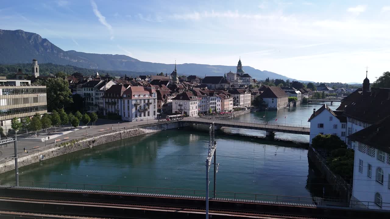 Scenic cityscape view with a river and bridge