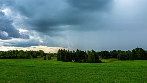 time lapse of rain clouds washing over a green countryside