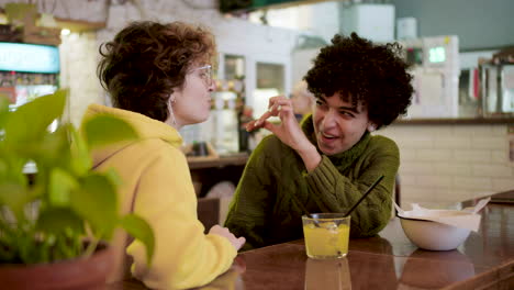 Lesbian-couple-in-a-bar