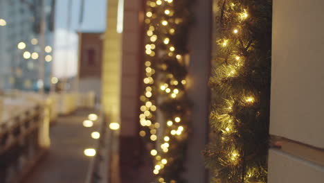 christmas decorations on building exterior at night