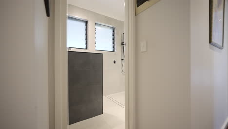 Hallway-of-contemporary-modern-house-into-luxurious-bathroom