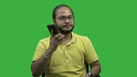 Vivek-with-aspects-man-boy-with-long-hairs-talking-on-phone-croma-background