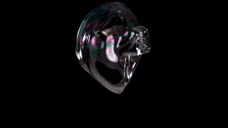 Highspeed Slowmotion captures connected soap bubbles merging and deforming into an irregular reflective shape on black