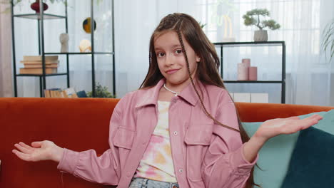 confused child girl feeling embarrassed about ambiguous question having doubts no idea clueless