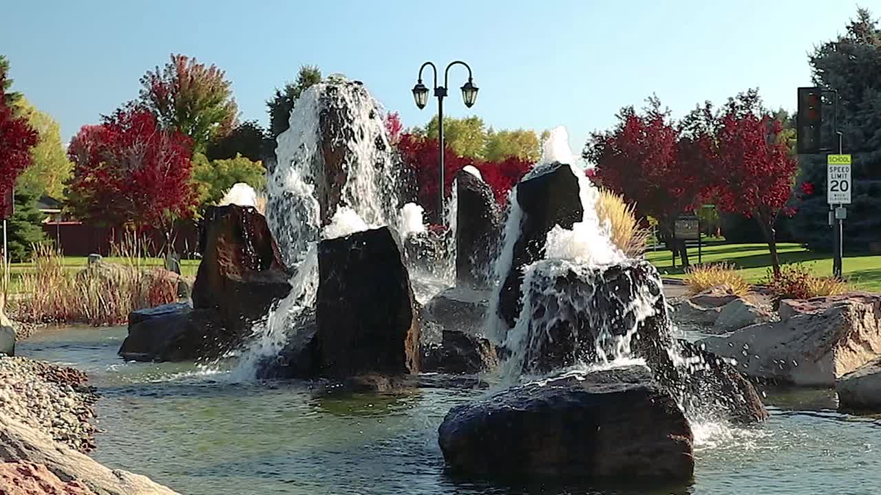 Tall Water Fountains And Water Features Surrounded By Foliage Actual Speed 20 Second Video