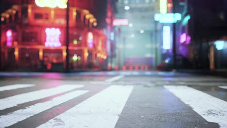 nighttime city street with neon lights