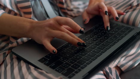 Journalist-hands-using-laptop-at-remote-office-closeup.-Busy-girl-type-keyboard