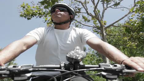 Time-lapse-of-a-man-riding-a-bike-through-streets