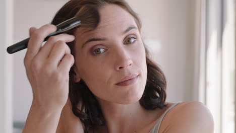 portrait beautiful woman applying makeup getting ready at home looking in mirror enjoying natural complexion morning preparation