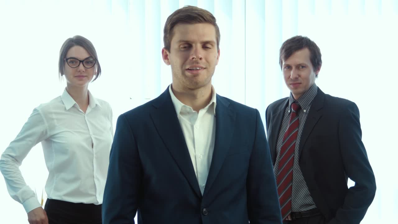 Business Team Giving Thumbs Up