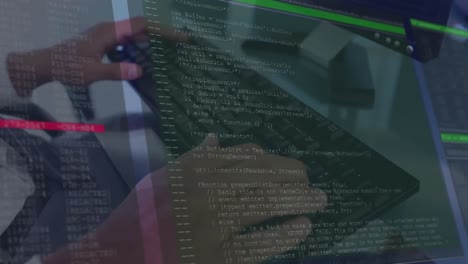 Animation-of-data-processsing-against-mid-section-of-a-man-typing-on-keyboard-at-office