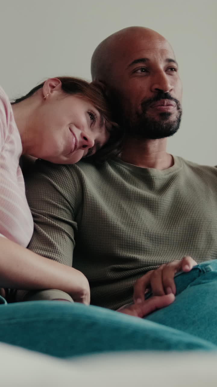 Happy Couple Relaxing Together At Home