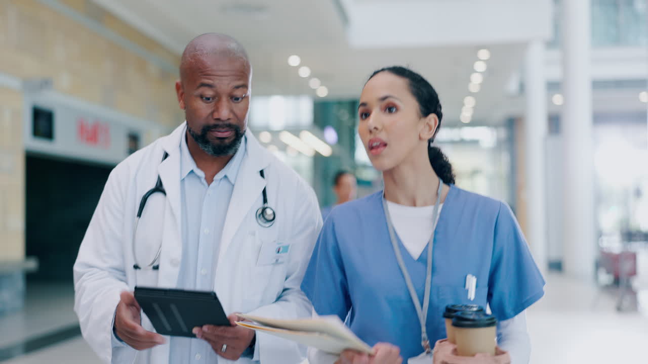 Talking, doctor and nurse with tablet in hospital