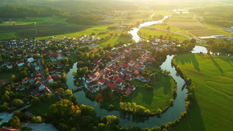 Stunning-aerial-4K-drone-footage-of-Kostanjevica-na-Krki-in-the-golden-sunset-light