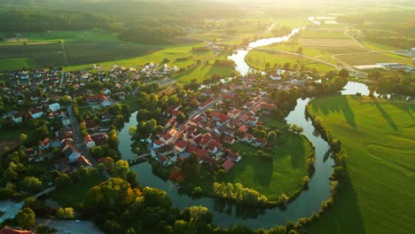 stunning aerial 4k drone footage of kostanjevica na krki in the golden sunset light