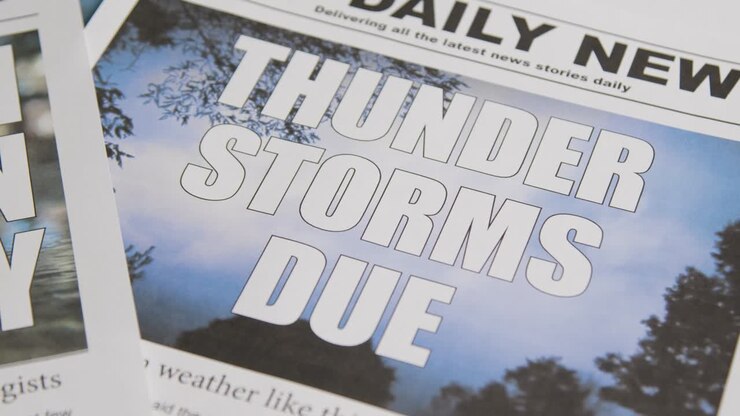 Newspaper Headline Discussing Extreme Weather Conditions And Thunder Storms In Global Warming Crisis