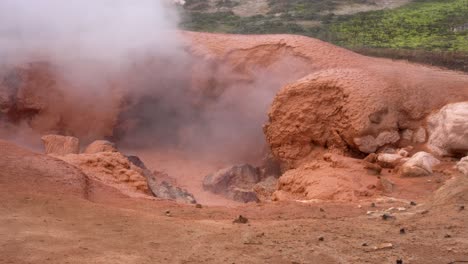 bubbling mudpot in yellowstone, wyoming