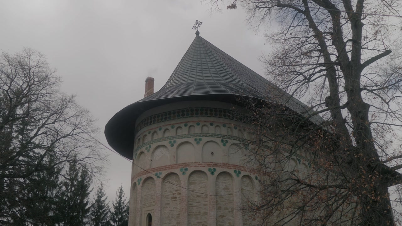 Panning shot of an old monastery in Moldova, Romania