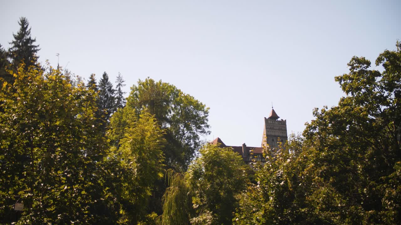 Medieval Castle Hidden Among Lush Green Trees