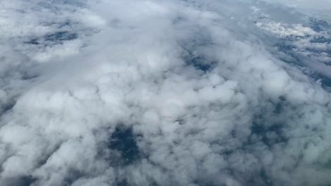 a "pilot's halo" also known as a "pilot's glory" seen from the window seat of an airplane flying above the clouds