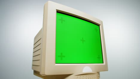 vintage crt computer monitor with green screen