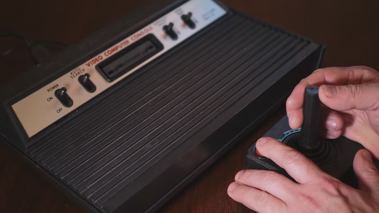 Playing With Vintage Video Computer Console TV Game Joystick. 4K Footage