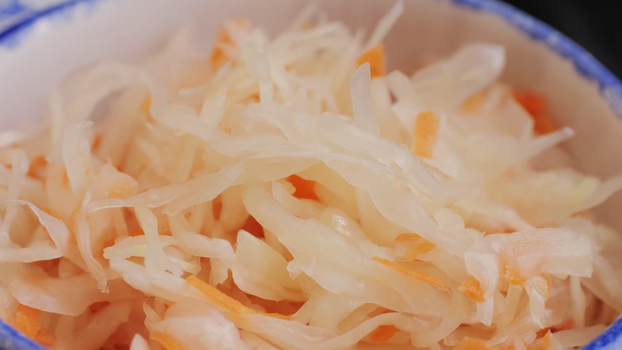 Sauerkraut fermented cabbage variety preserving jars. Homemade Sauerkraut with Carrot and Salad Cabbage with Beetroot on a wooden table. Fermented food.