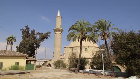 4k video footage of the hala sultan tekke or the mosque of umm haram on the edge of the salt lake in larnaca in cyprus