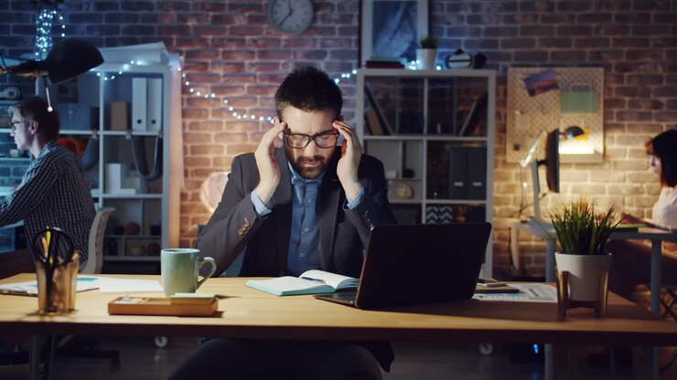 Businessman stressed at night work