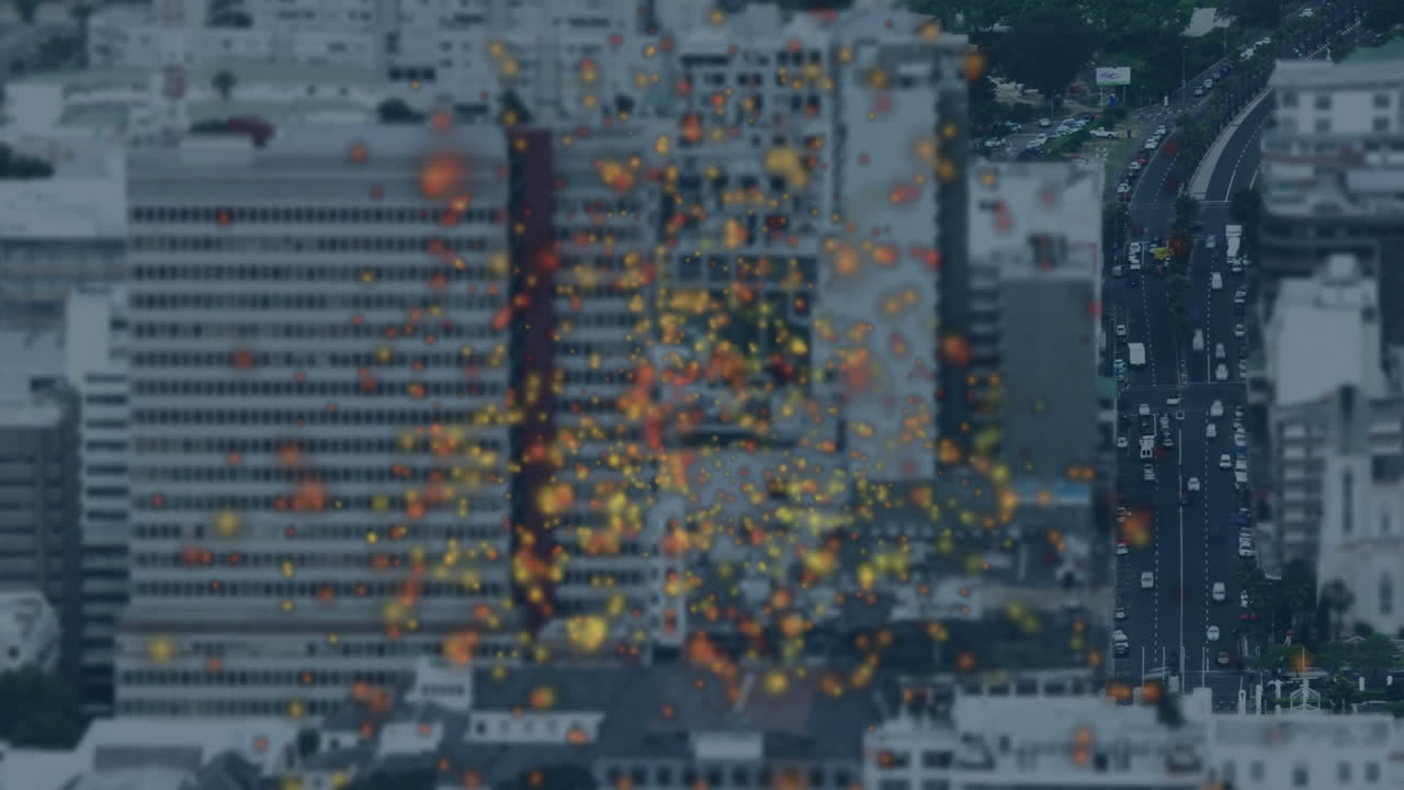 Animation of colorful particles floating over school near tall urban buildings