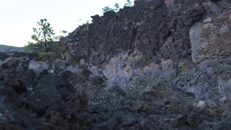 Barren-Rock-Formation-Of-Volcanic-Lava-Rocks,-Dolly-Left