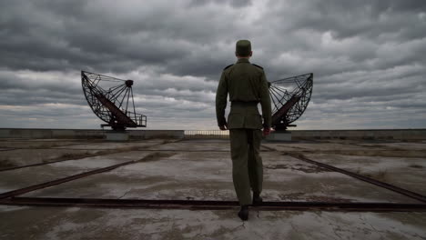 soldier walking at abandoned military radar site