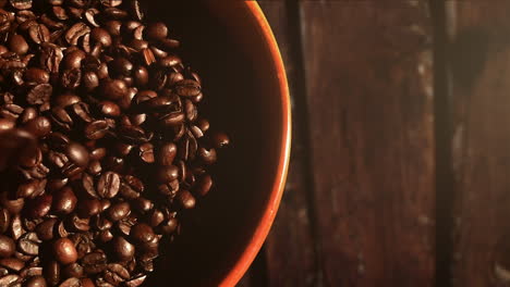 dropping coffee beans into a bowl