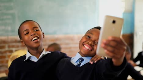 schoolboys taking selfie in the classroom 4k