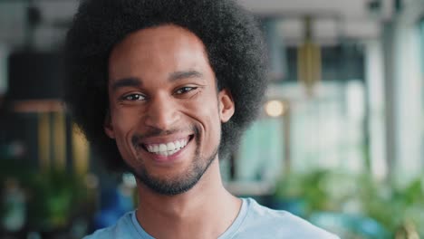 portrait of african man with big smile on his face