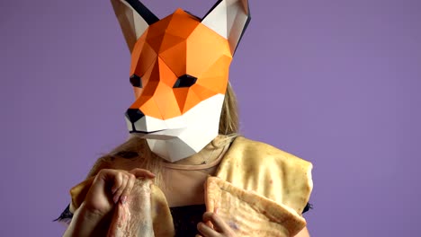 blonde girl with fox mask paper using pig skin for covering on purple background.