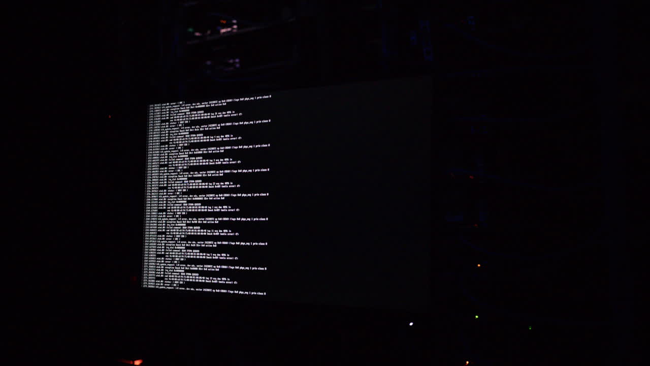 Close up of code on a screen in a server room