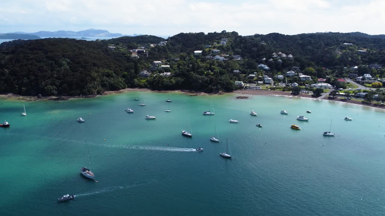 AERIAL Side Panning Shot of Russell and its Boats in New Zealand