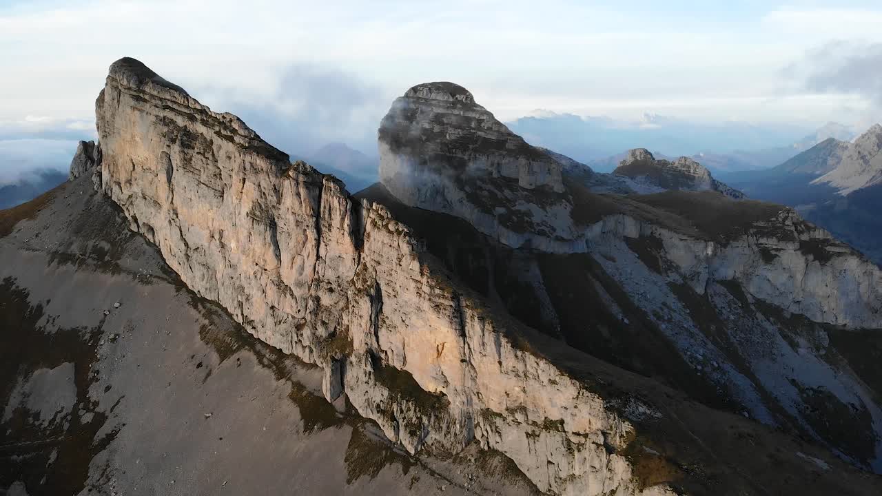 Aerial view of Tour d'A&iuml; and Tour de Mayen in Leysin, Vaud, Switzerland during a colorful autumn afternoon in the Swiss Alps