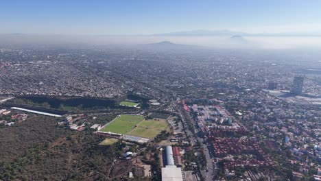 Smoggy morning sky over eastern Mexico City, captured from above